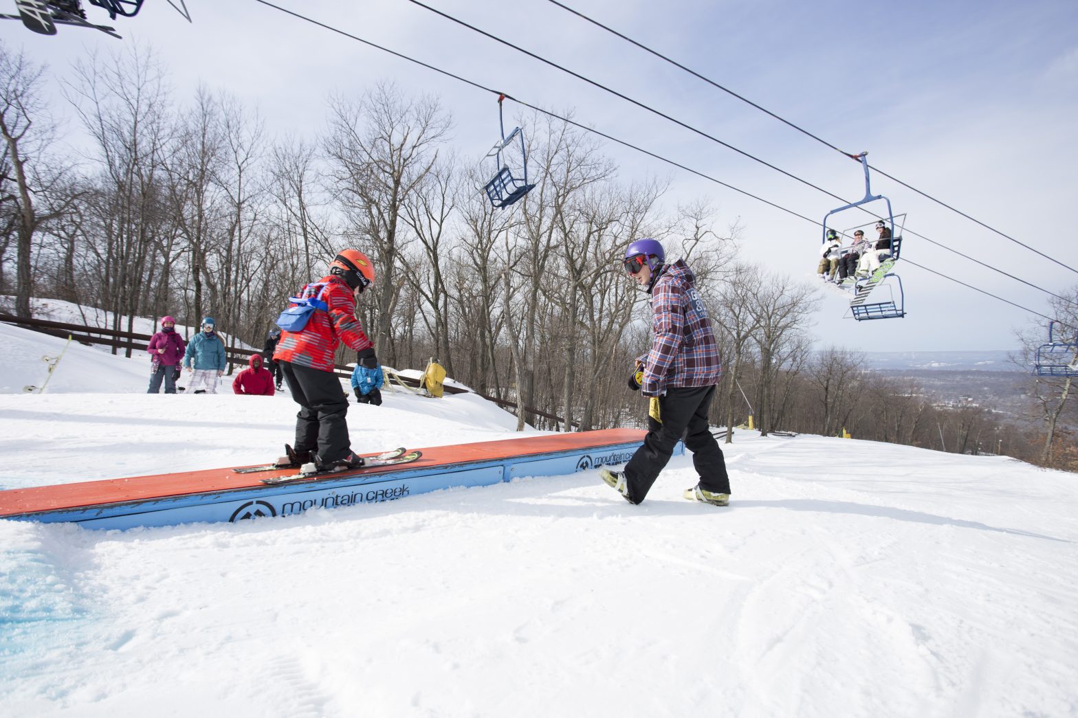 Young skier learning how to hit a box at Mountain Creek in Vernon New Jersey